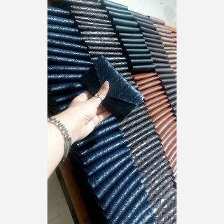 کیف توتون چرم مصنوعی چرخدوز با طراحی شیک و مقاوم